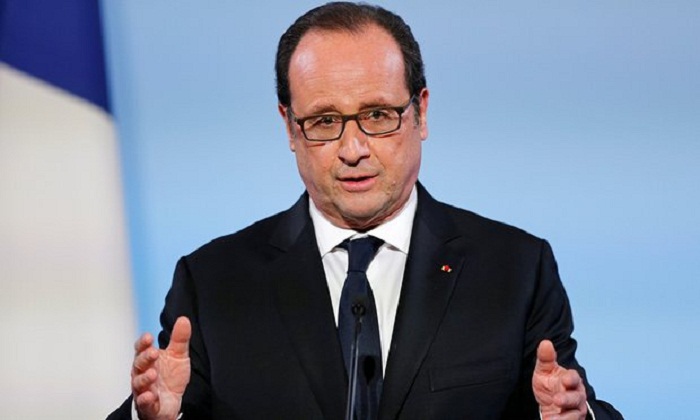 François Hollande pardons woman for murder of husband 